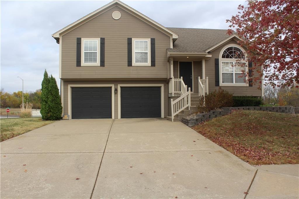 split level home with a garage