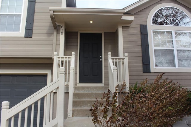 property entrance featuring a garage