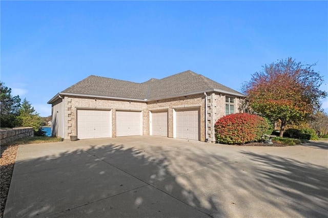 view of side of property featuring a garage