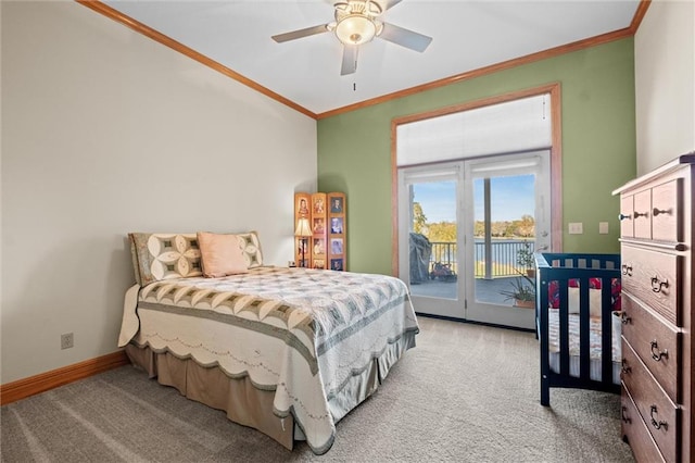 carpeted bedroom with ceiling fan, crown molding, and access to outside