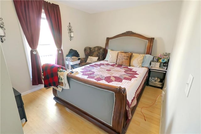 bedroom featuring light hardwood / wood-style floors