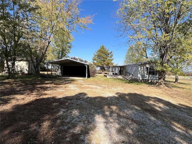 view of yard featuring a carport