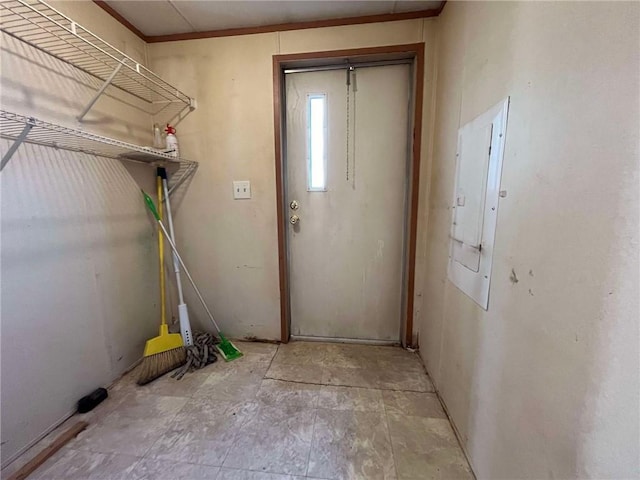 laundry area with electric panel