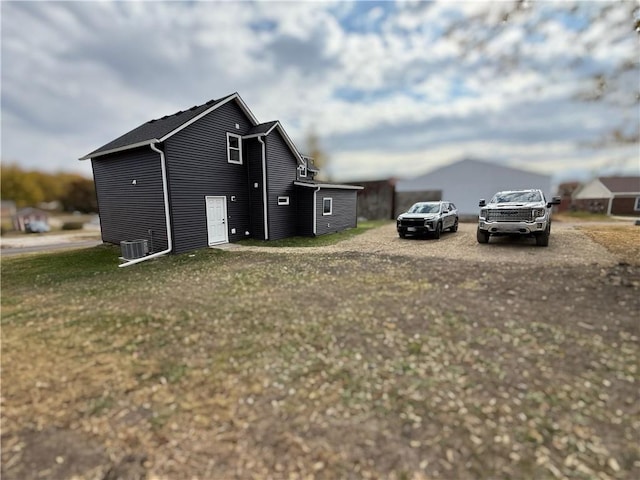 view of home's exterior with cooling unit