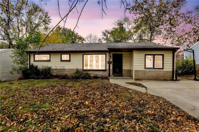 ranch-style house featuring a porch