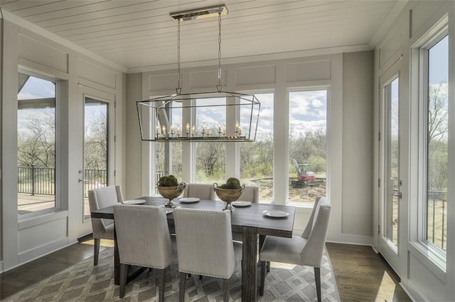16904 Parkhill St, Overland Park, KS 66221 - sunroom / solarium featuring healthy amount of natural light and a chandelier