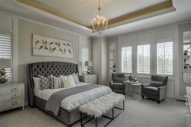 16904 Parkhill St, Overland Park, KS 66221 - bedroom with a tray ceiling, carpet flooring, a chandelier, and ornamental molding