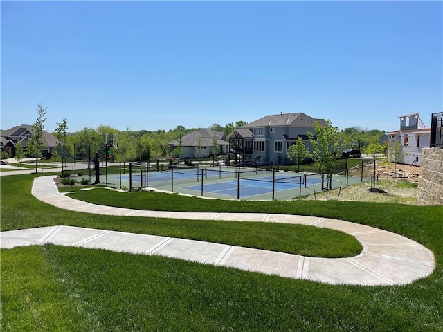 16904 Parkhill St, Overland Park, KS 66221 - view of tennis court featuring a residential view