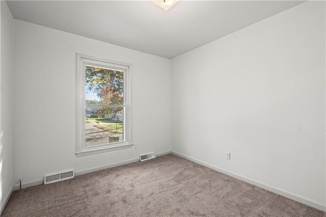 view of carpeted spare room