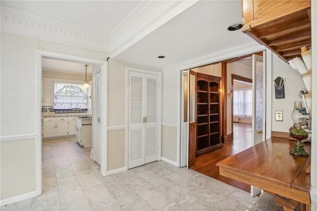 503 S 2nd St, Clinton, MO 64735 - corridor featuring plenty of natural light, crown molding, and baseboards
