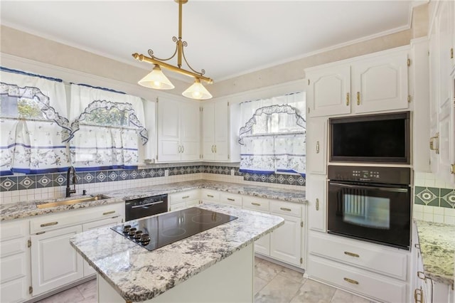 kitchen with a center island, backsplash, black appliances, white cabinets, and sink