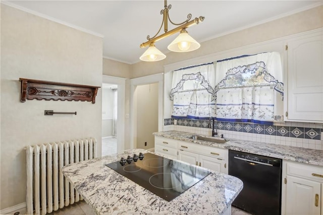 kitchen with radiator, black appliances, sink, white cabinets, and hanging light fixtures