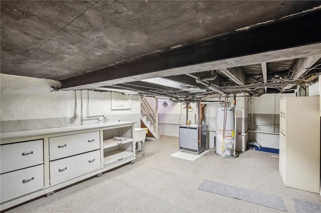 503 S 2nd St, Clinton, MO 64735 - unfinished basement featuring gas water heater and stairway