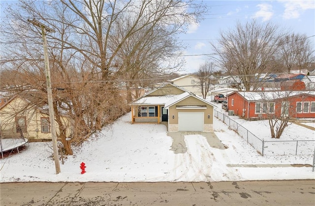 view of front of property featuring a garage