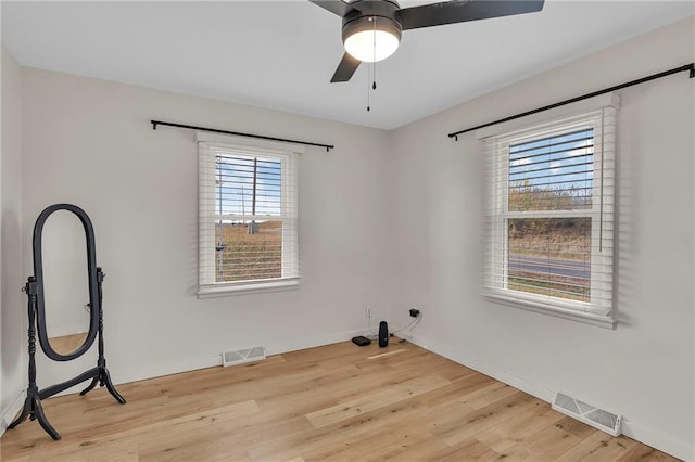 interior space featuring light hardwood / wood-style flooring and ceiling fan