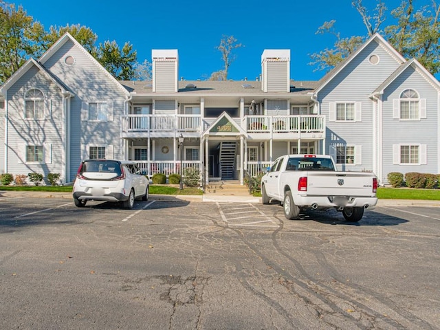 multi unit property featuring a balcony