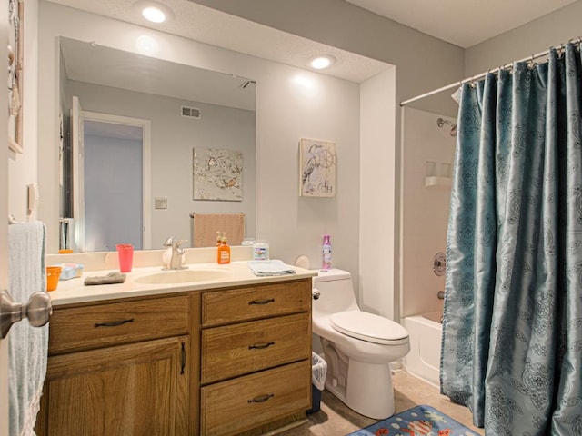 full bathroom with vanity, shower / tub combo with curtain, toilet, and tile patterned flooring