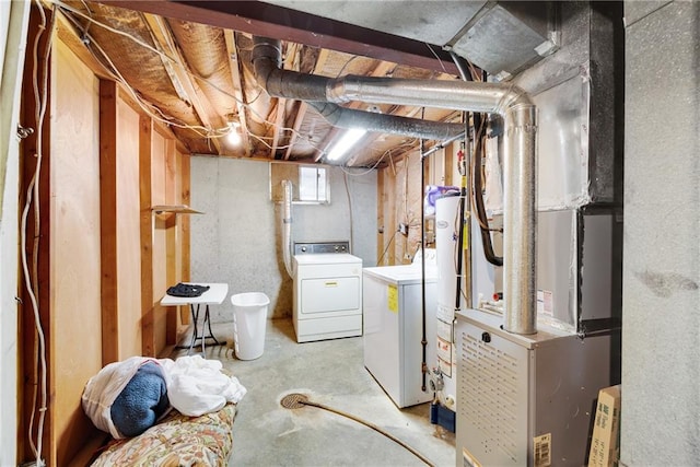 basement featuring separate washer and dryer and gas water heater