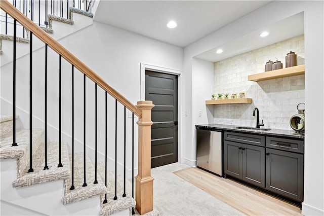 12967 S Constance St, Olathe, KS 66062 - kitchen featuring stainless steel dishwasher, open shelves, recessed lighting, decorative backsplash, and light carpet