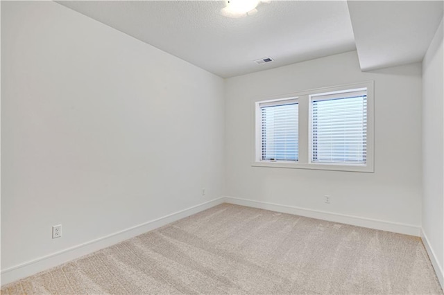 12967 S Constance St, Olathe, KS 66062 - spare room featuring baseboards and light colored carpet