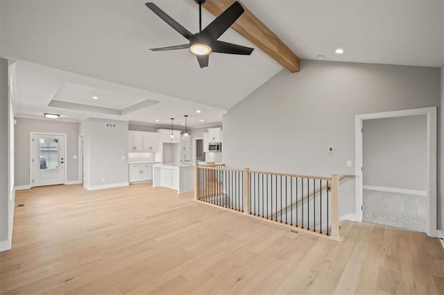 unfurnished living room with light wood-type flooring, a ceiling fan, baseboards, and recessed lighting