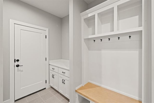 mudroom with light tile patterned floors