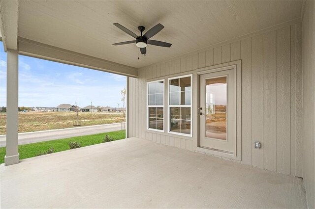 view of patio featuring ceiling fan