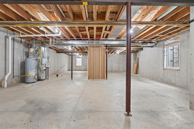 below grade area with gas water heater and heating unit