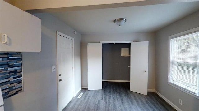 interior space featuring dark hardwood / wood-style flooring