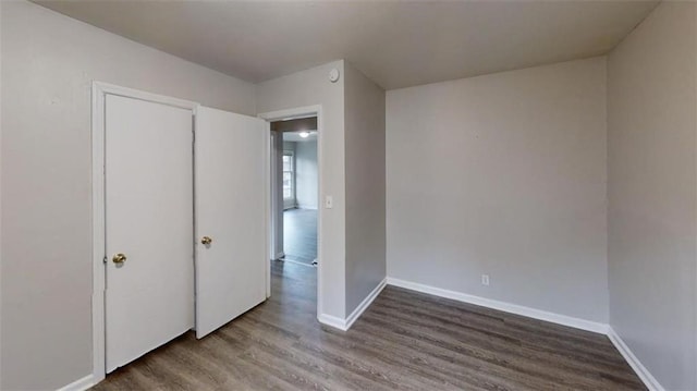 unfurnished bedroom featuring hardwood / wood-style floors