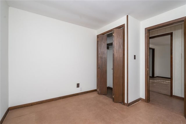 unfurnished bedroom featuring a closet