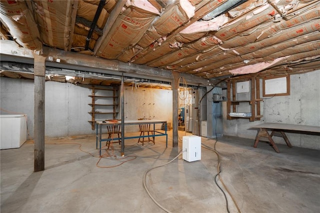 basement with white refrigerator