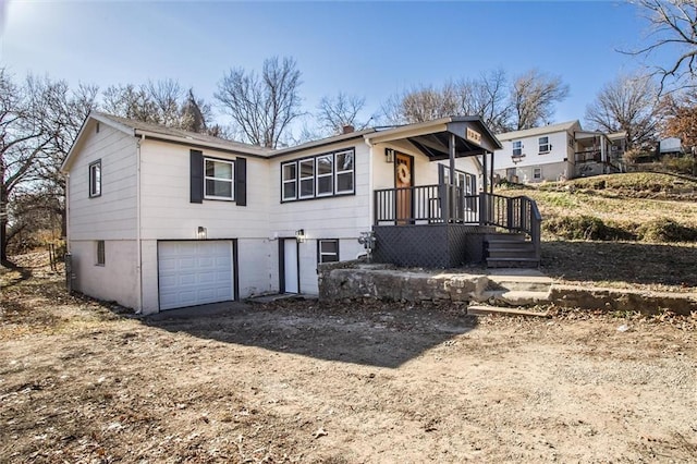 view of front of home with a garage