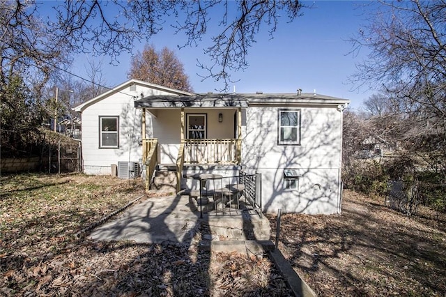 view of front of home featuring covered porch and central AC unit