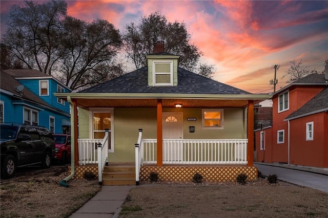 bungalow-style home with a porch