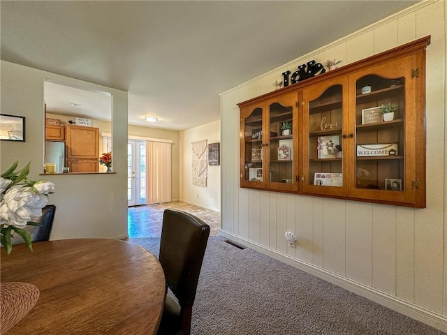 view of carpeted dining area