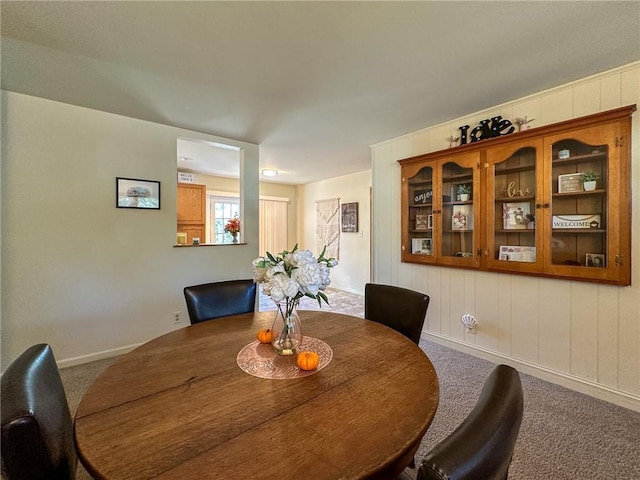 view of carpeted dining space