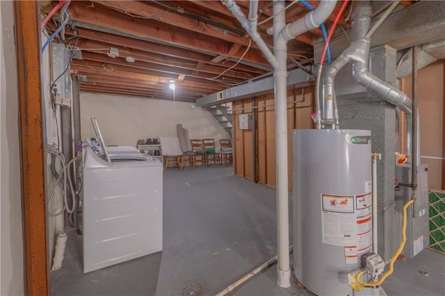 basement featuring gas water heater and washer and dryer