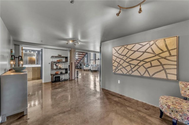 living room featuring concrete floors