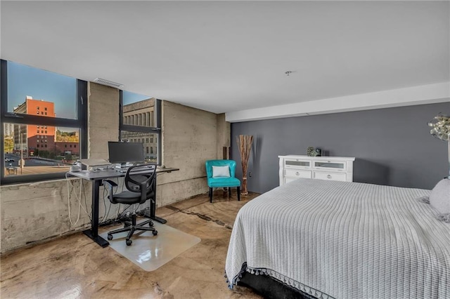 bedroom with concrete floors