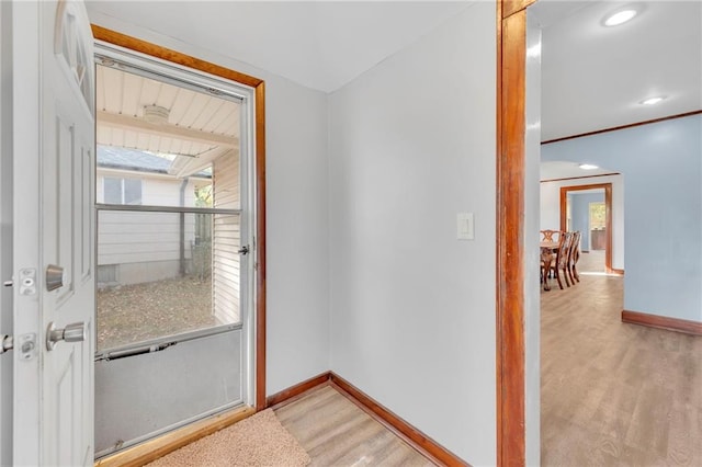 doorway with light hardwood / wood-style floors