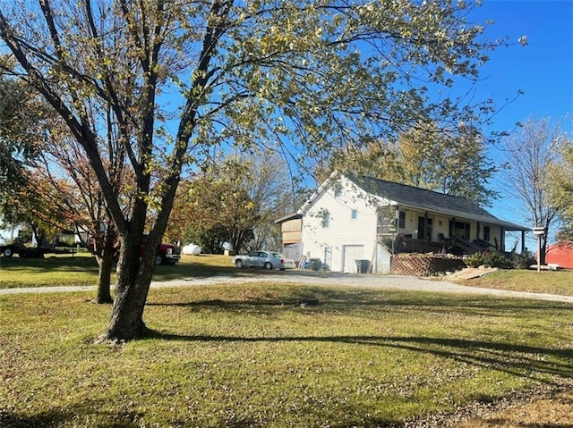 view of property exterior with a lawn