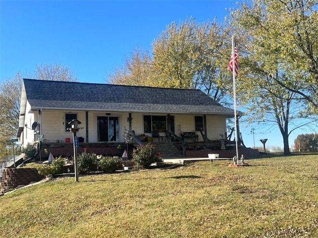 single story home featuring a porch and a front lawn