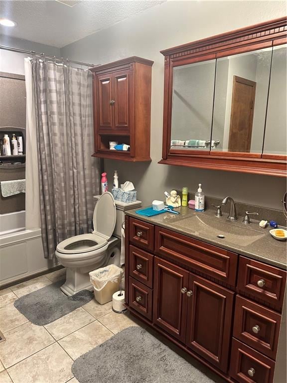 full bathroom with toilet, shower / bath combo, vanity, and tile patterned flooring