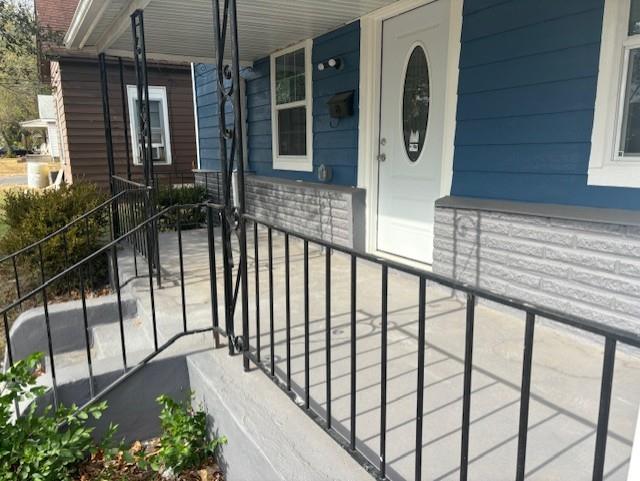 entrance to property with a porch