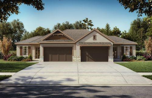 view of front of home with a front yard and a garage