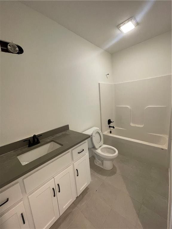 full bath with toilet, vanity, and shower / tub combination