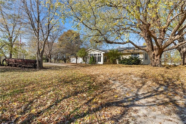 view of yard with a garage