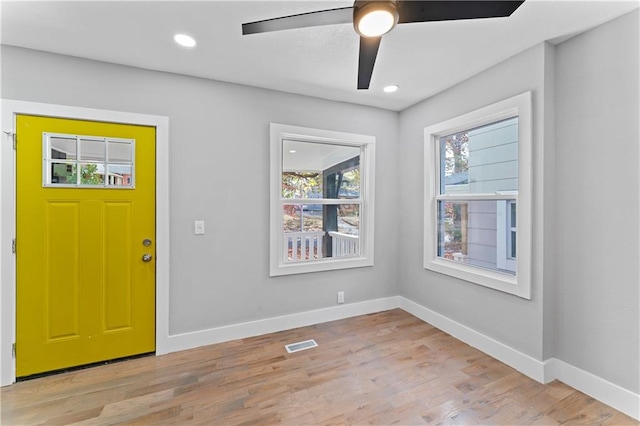 entrance foyer featuring light hardwood / wood-style floors and ceiling fan