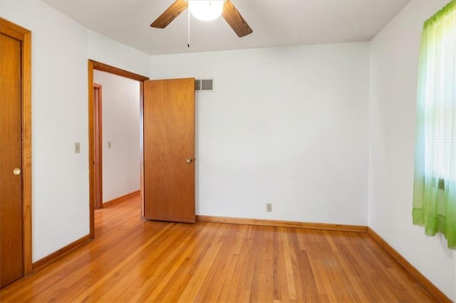 unfurnished bedroom with light hardwood / wood-style floors and ceiling fan